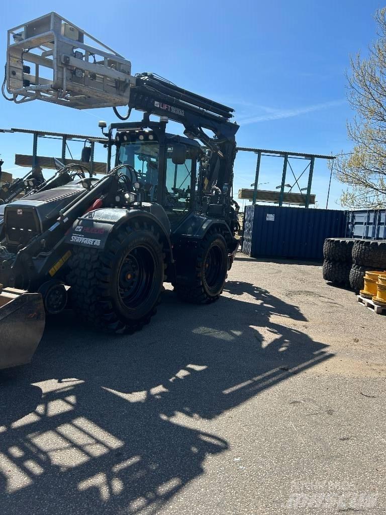 Huddig 1260 D Товарач със заден ексватор