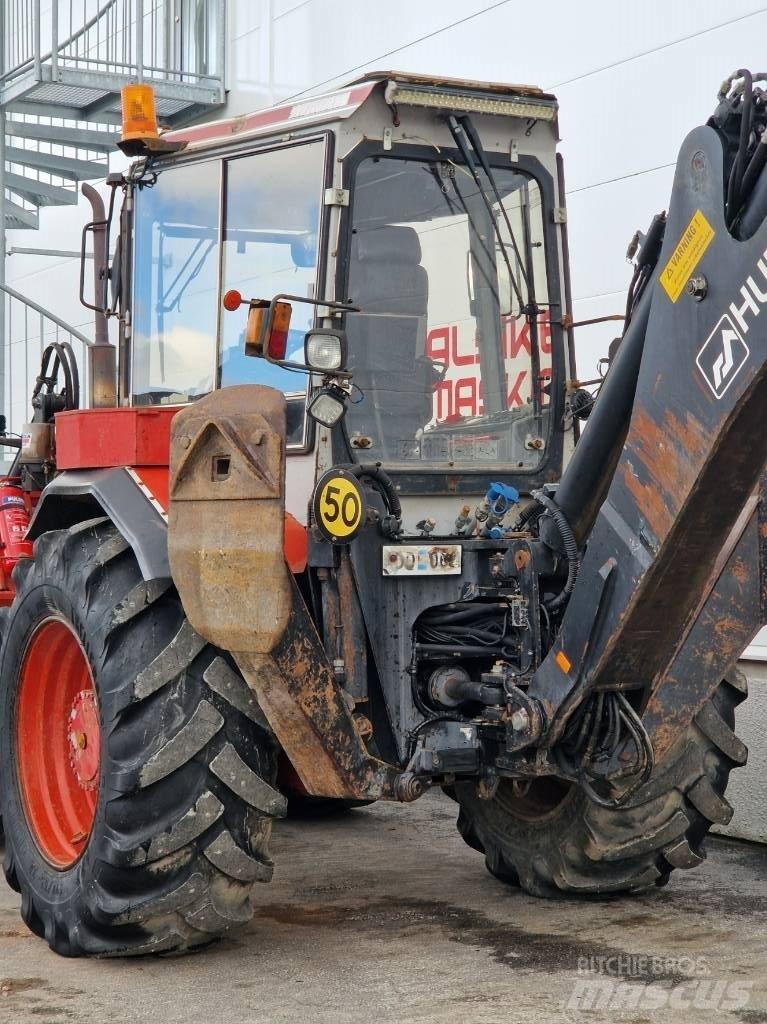 Huddig 1160 Товарач със заден ексватор