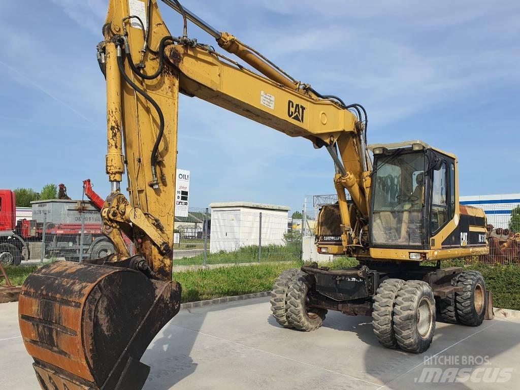 CAT M 318 Колесни екскаватори