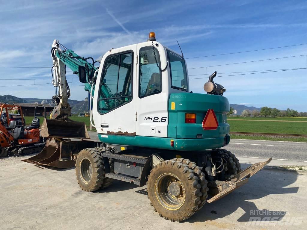New Holland MH 2.6 Колесни екскаватори