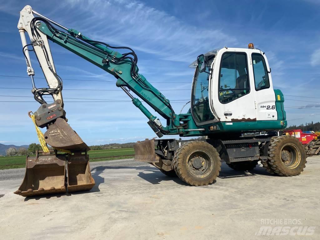 New Holland MH 2.6 Колесни екскаватори