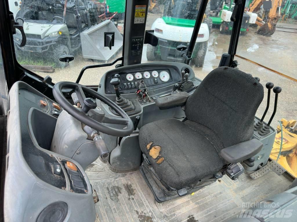 CAT 446 D Товарач със заден ексватор