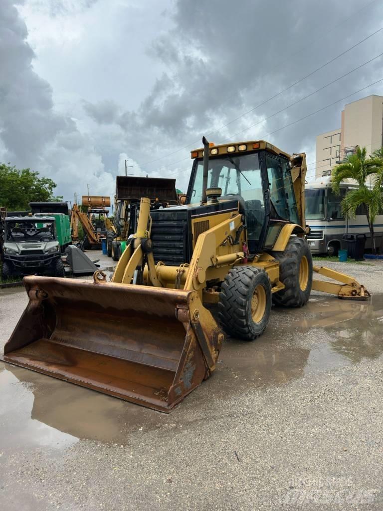 CAT 446 D Товарач със заден ексватор