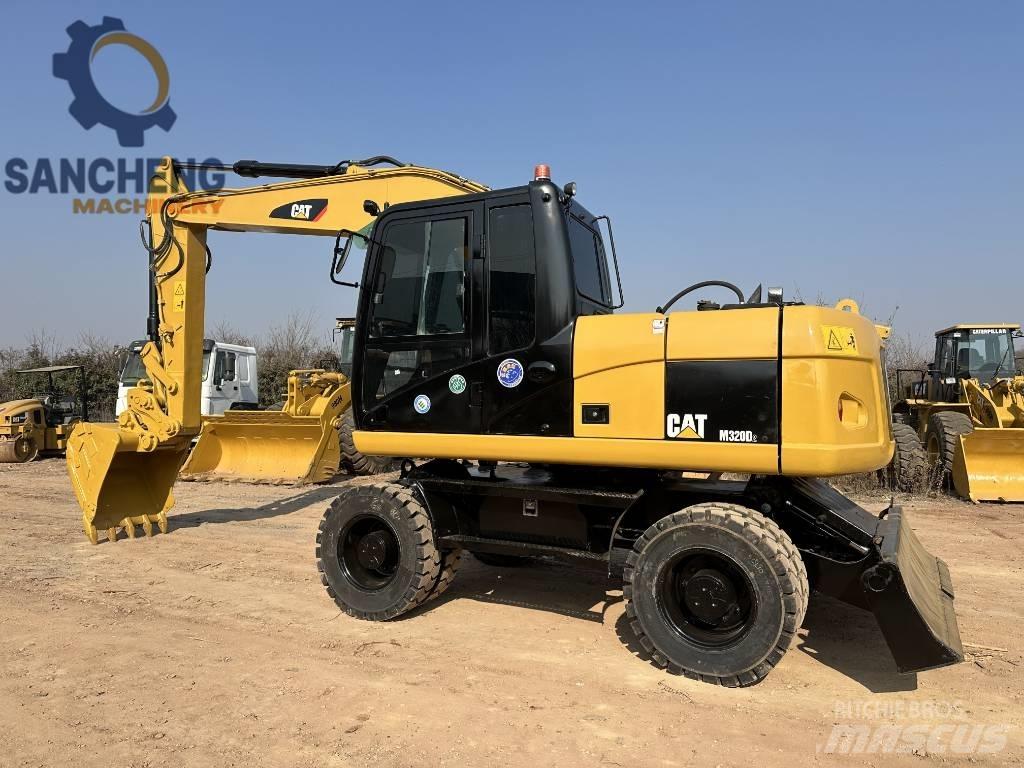 CAT M 320 D Колесни екскаватори