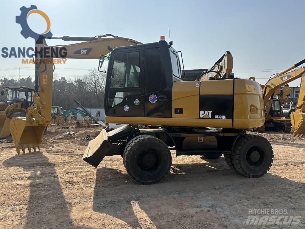 CAT M 320 D Колесни екскаватори