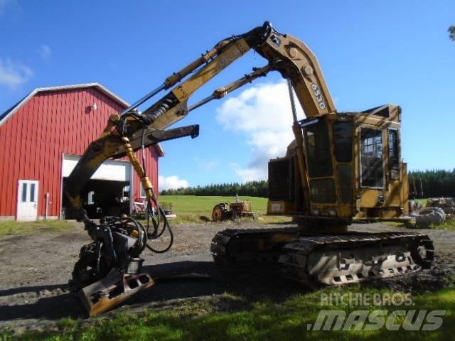 John Deere 653G Харвестери