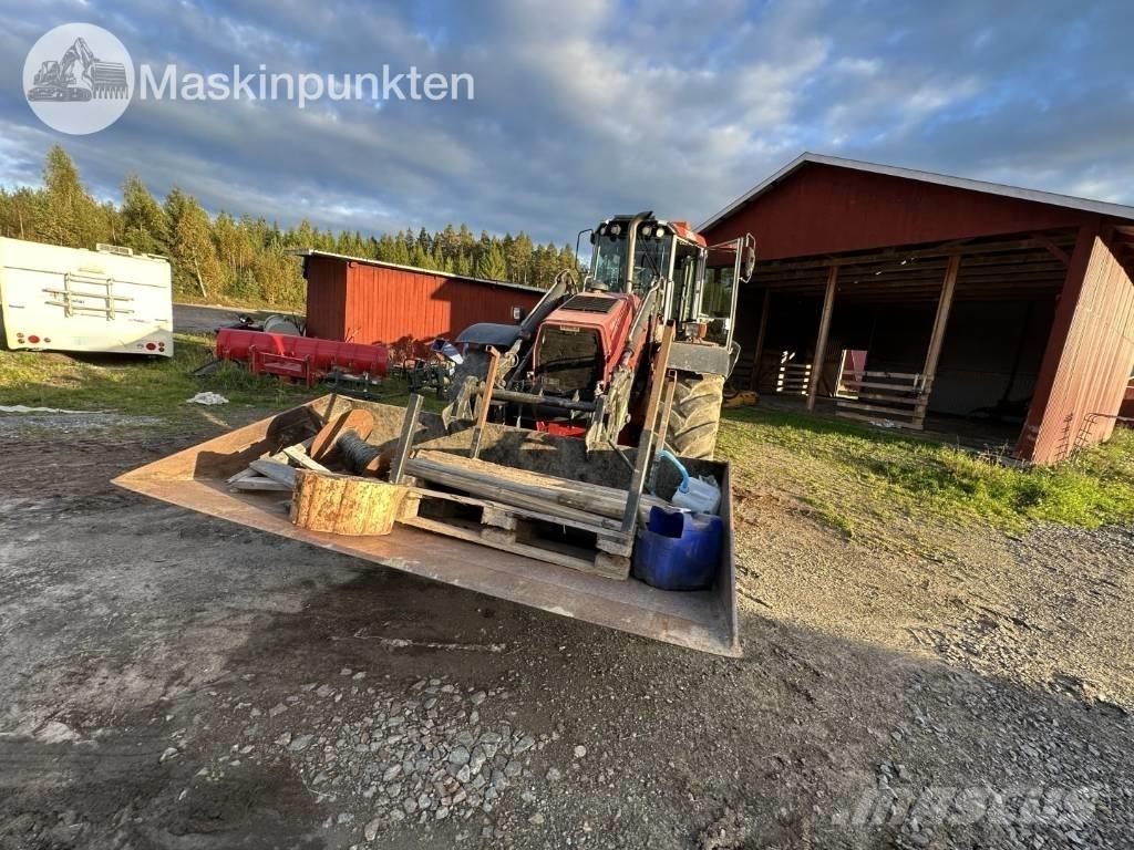 Huddig 1260 B Товарач със заден ексватор