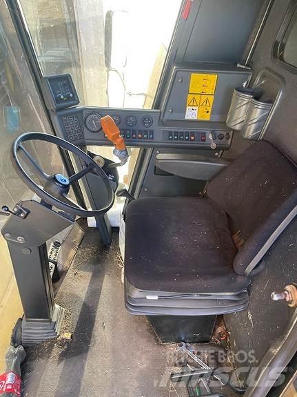 New Holland TC 56 Комбайни