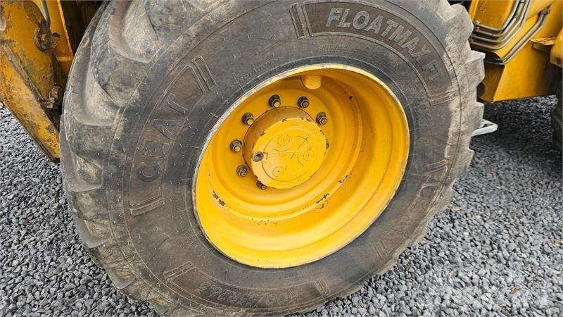 Hydrema 906D Товарач със заден ексватор