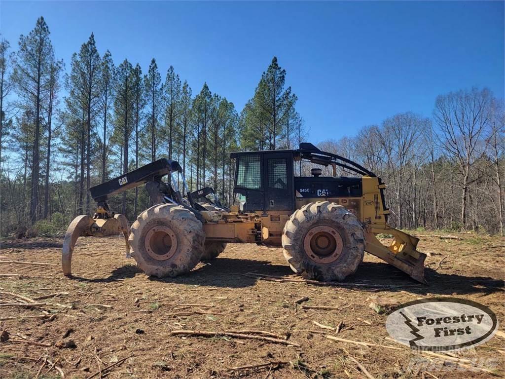 CAT 545C Скидери
