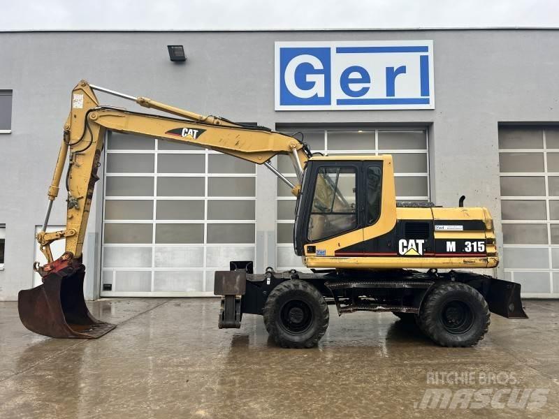 CAT M 315 Колесни екскаватори