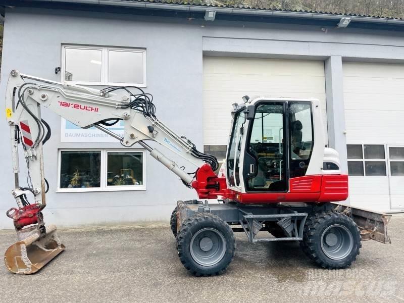 Takeuchi TB295W Колесни екскаватори