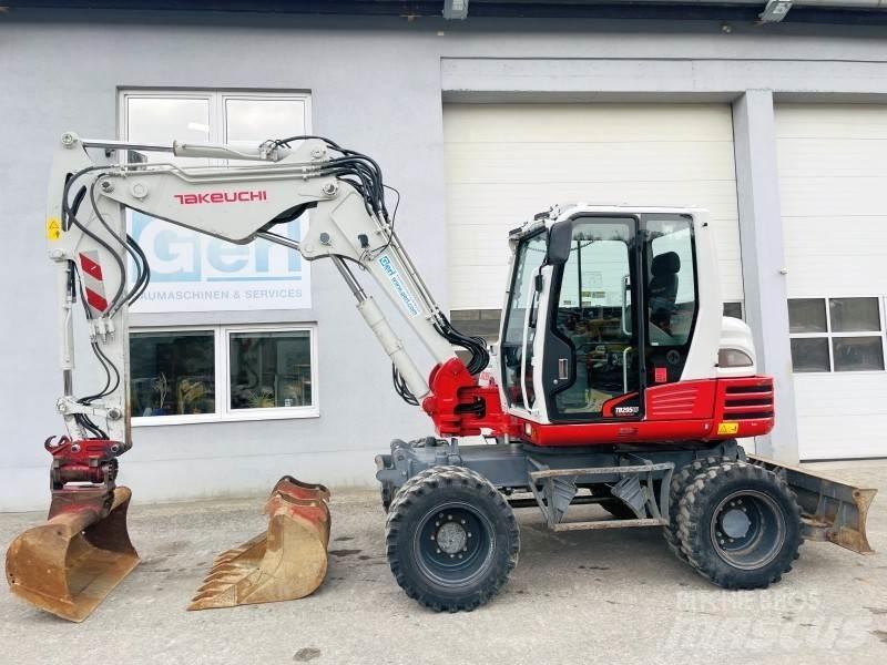Takeuchi TB295W Колесни екскаватори