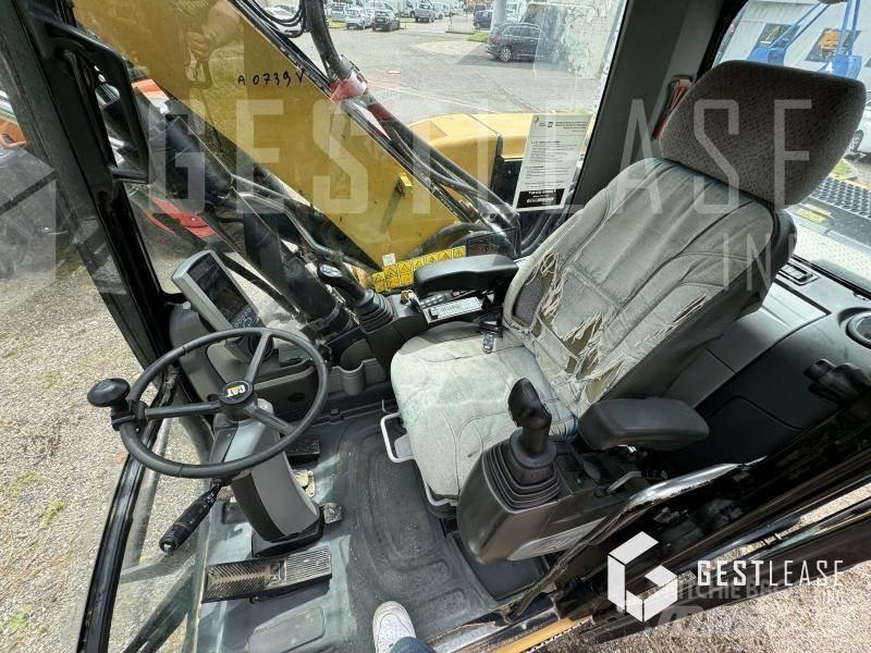 CAT M313D Колесни екскаватори