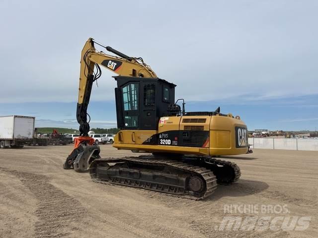 CAT 320DFM Машини за цепене и рязане на дърва