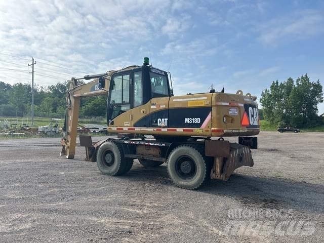 CAT M318D Колесни екскаватори
