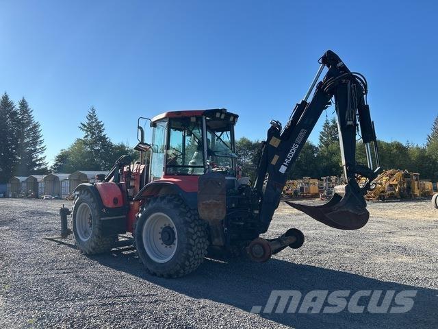 Huddig 1260-B Товарач със заден ексватор