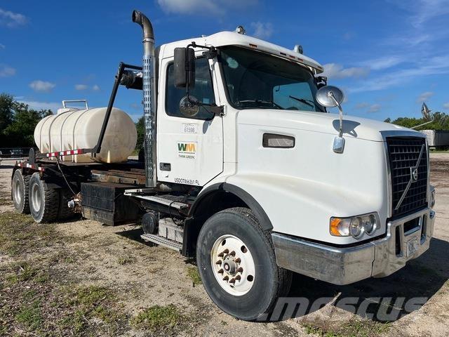 Volvo VHD64 Камиони със скипов подемник
