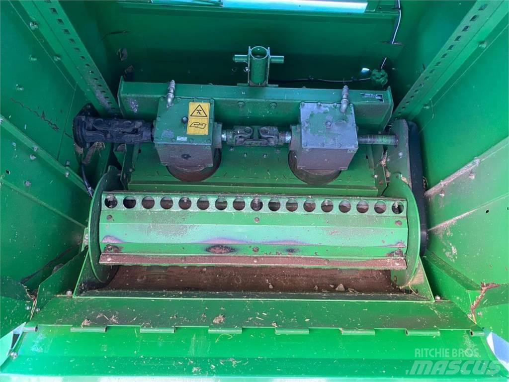 John Deere C670 Комбайни