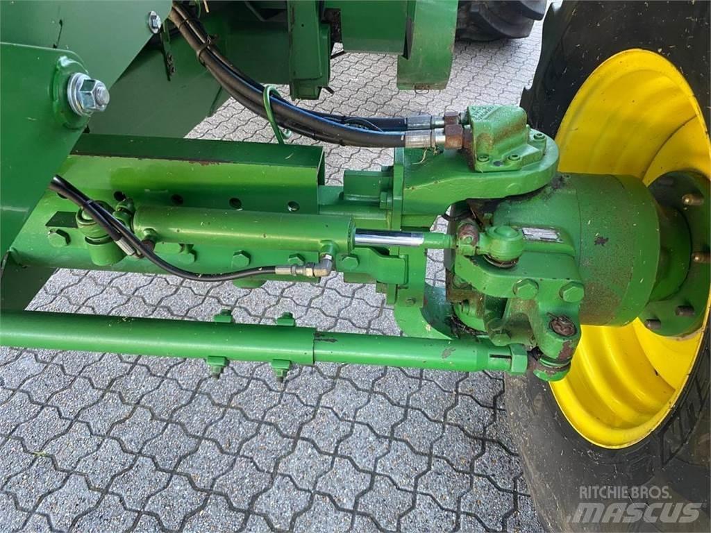 John Deere C670 Комбайни