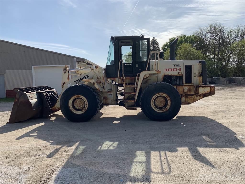Terex TXL300 Колесни товарачи