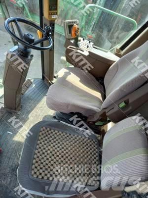 John Deere C670 Комбайни