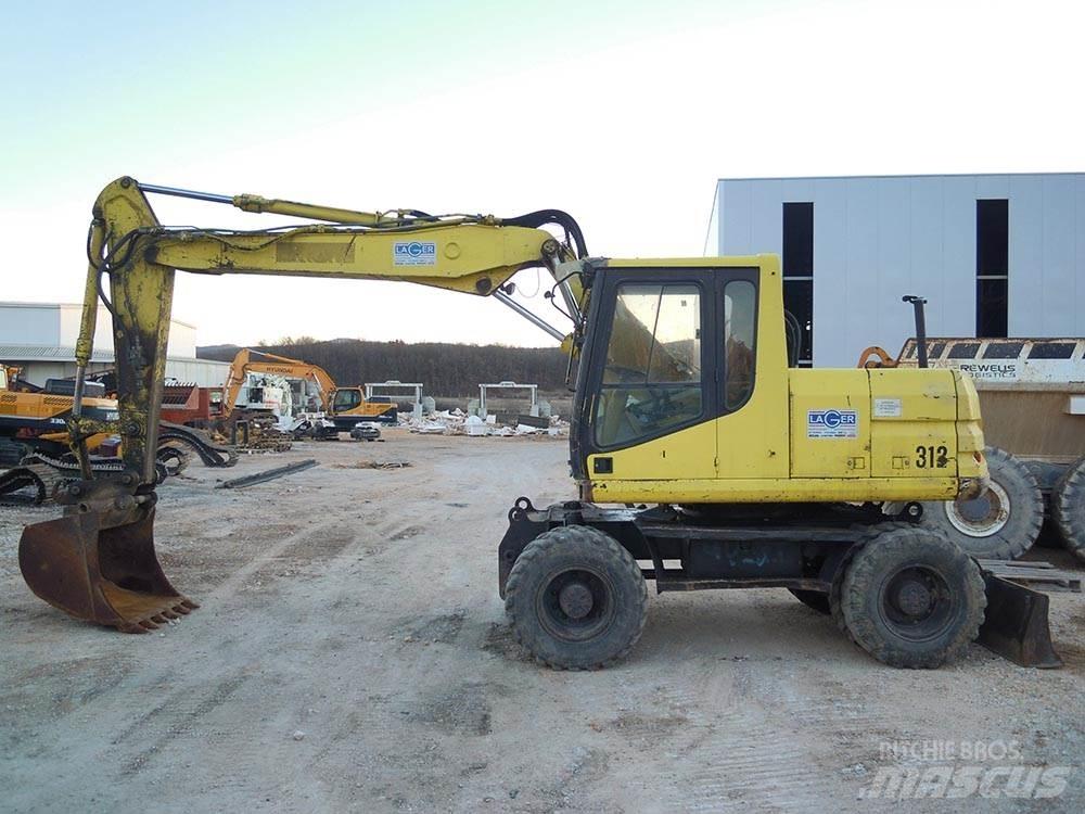 CAT M312 Колесни екскаватори