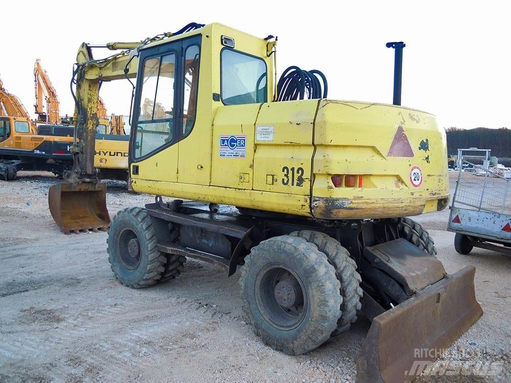 CAT M312 Колесни екскаватори