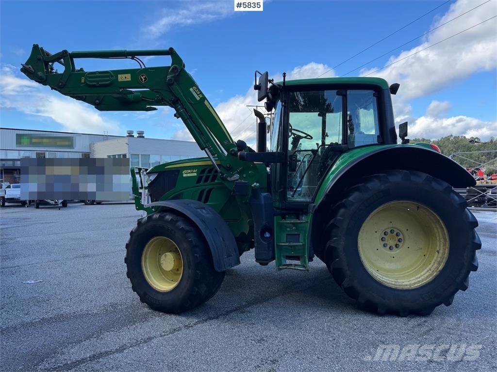 John Deere 6130M Трактори