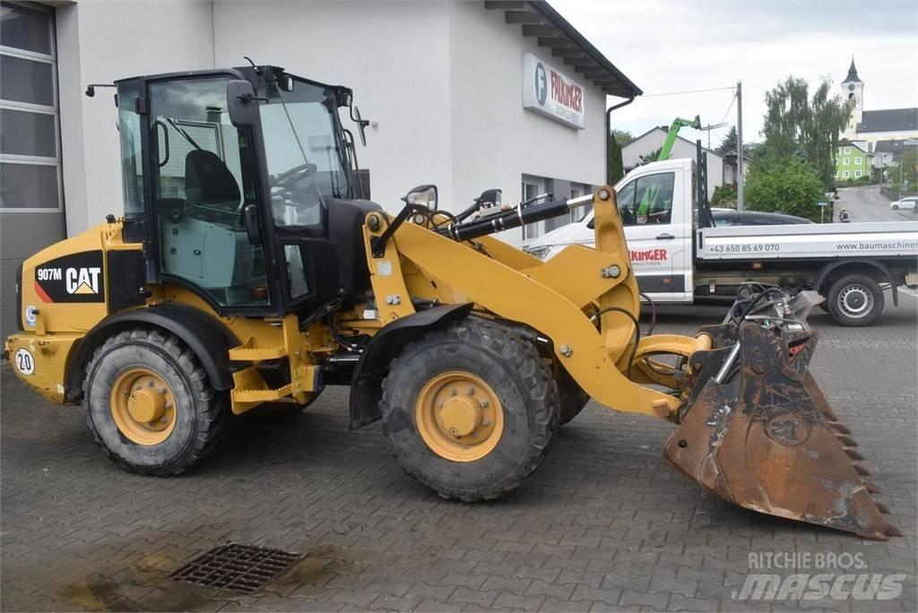 CAT 907M Колесни товарачи
