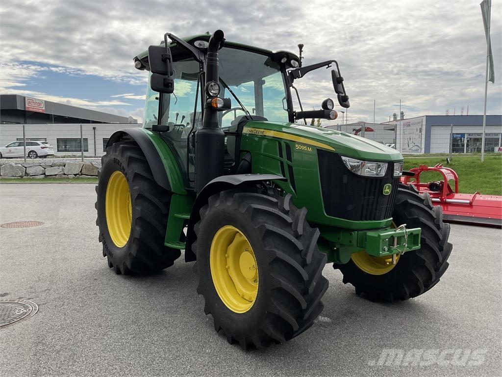 John Deere 5095M Трактори