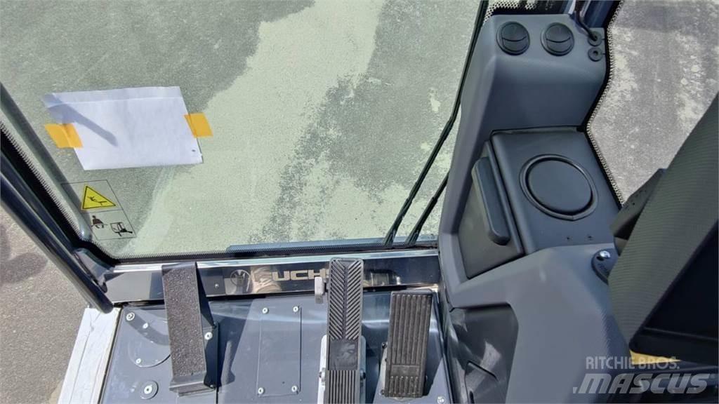 Fuchs MHL 320 Колесни екскаватори