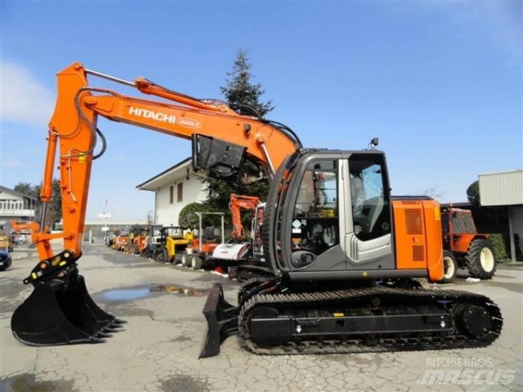Hitachi ZX135 US-6 Екскаватори