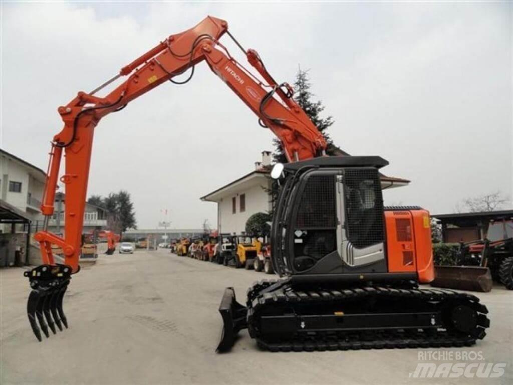 Hitachi ZX135 US-6 Екскаватори
