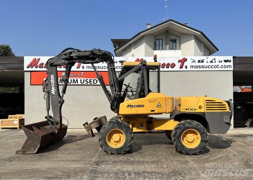 Mecalac 12MXT-E Колесни екскаватори