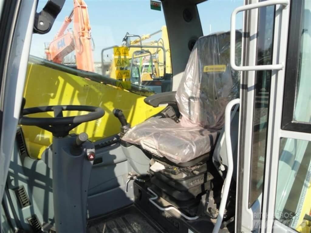 New Holland WE210 Колесни екскаватори