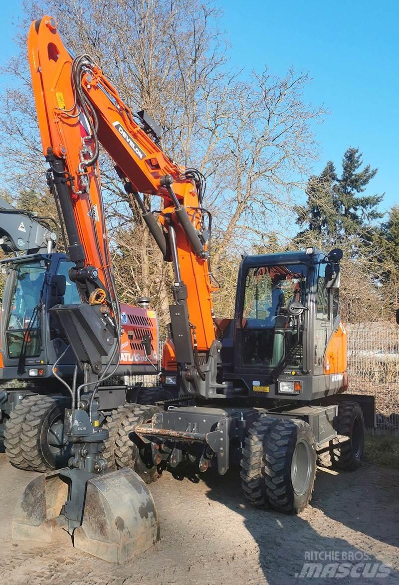 Develon DX 100 W-7 Колесни екскаватори