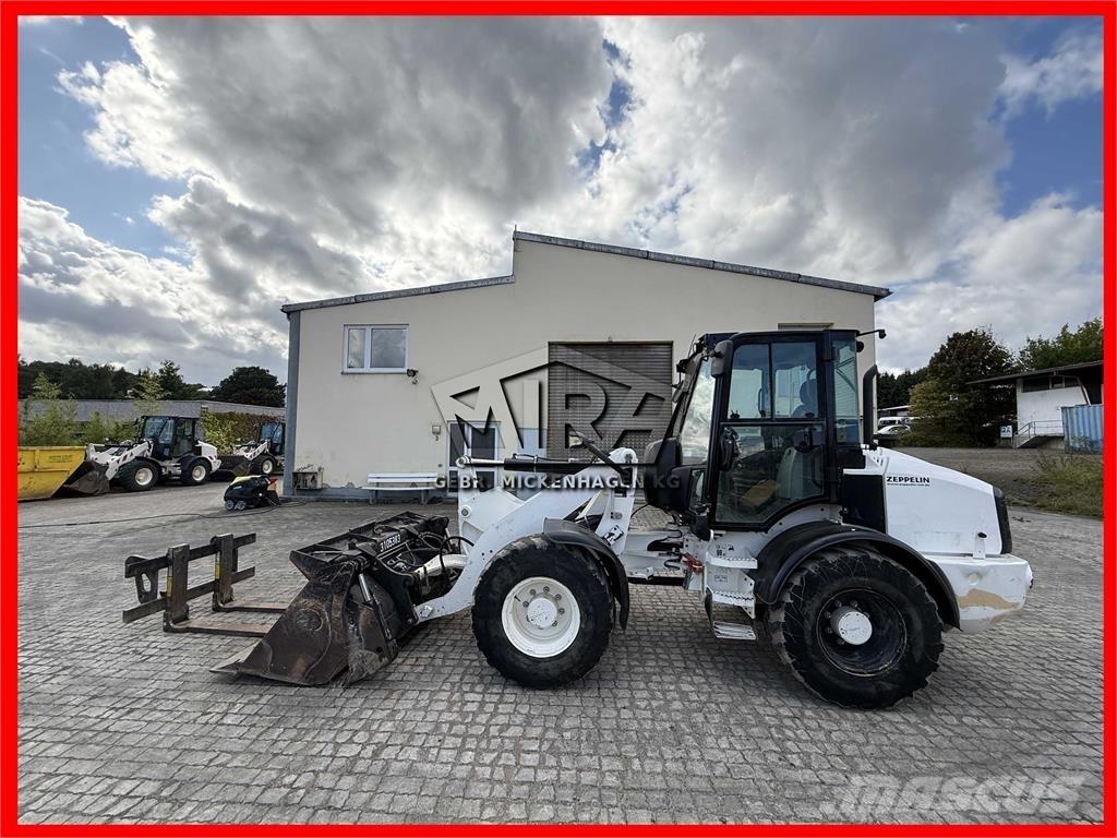 CAT 908M Колесни товарачи