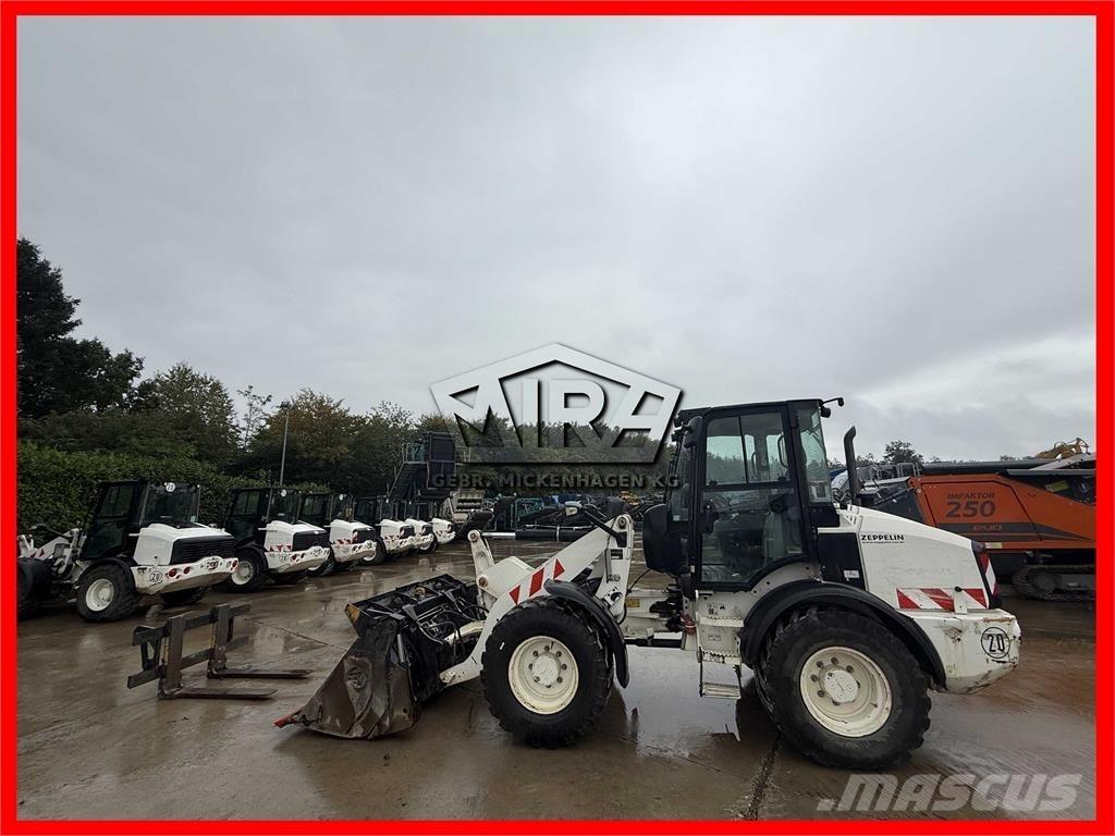 CAT 908M Колесни товарачи