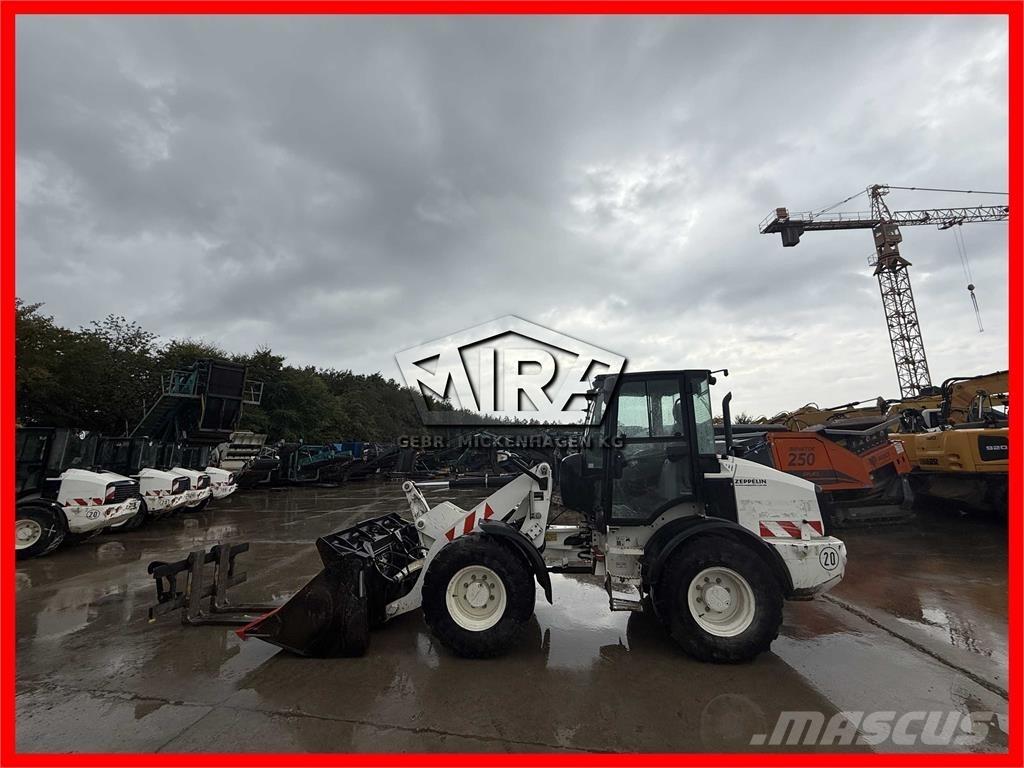 CAT 908M Колесни товарачи