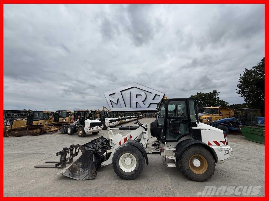 CAT 908M Колесни товарачи