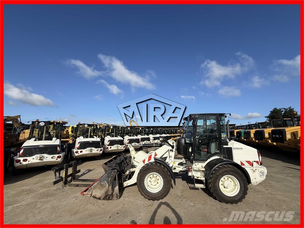 CAT 908M Колесни товарачи