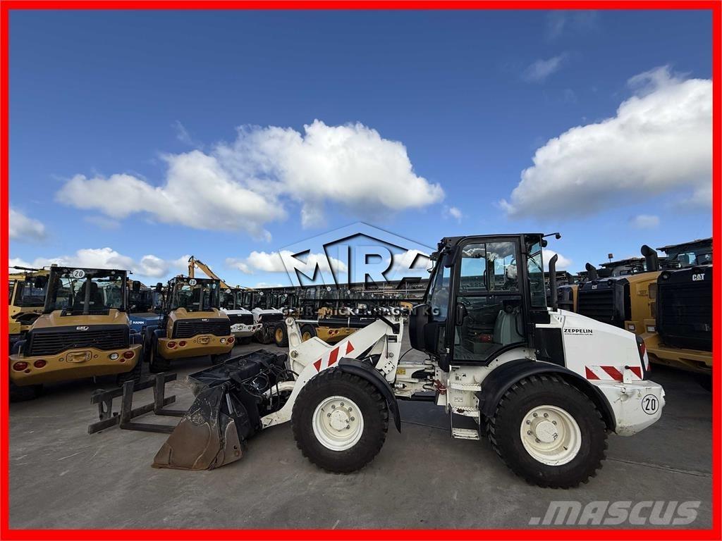 CAT 908M Колесни товарачи
