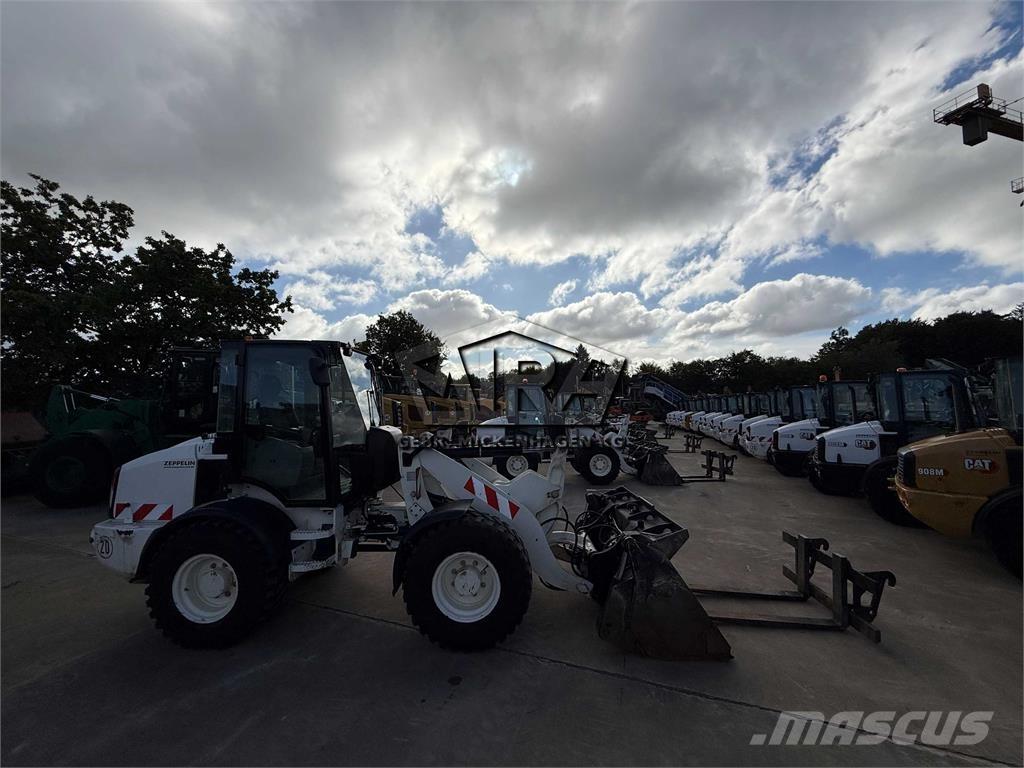 CAT 908M Колесни товарачи