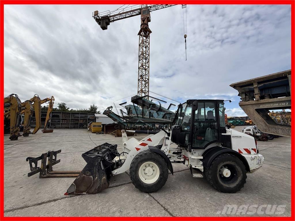 CAT 908M Колесни товарачи