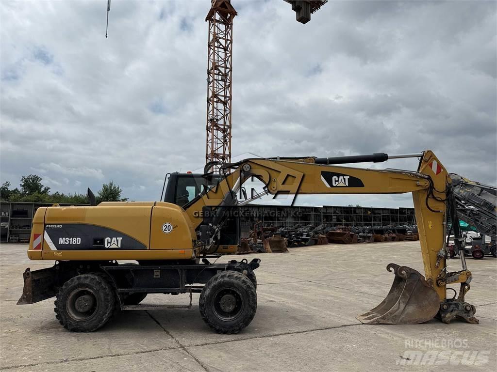 CAT M 318 D Колесни екскаватори
