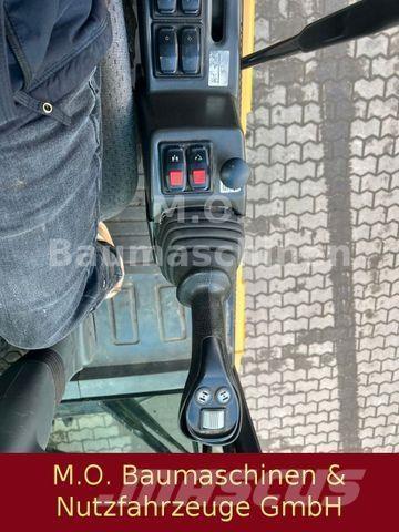 CAT MH 3022 Колесни екскаватори