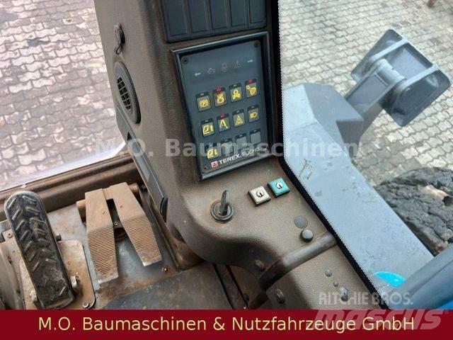 Fuchs MHL 350 Колесни екскаватори