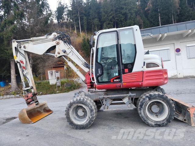 Takeuchi TB295W Колесни екскаватори