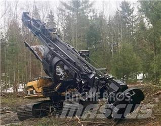 CAT 320L Машини за кастрене на дървета